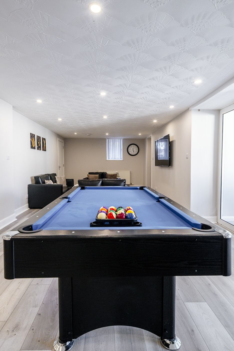Games room with a pool table, leather sofas and a TV, in Musselburgh